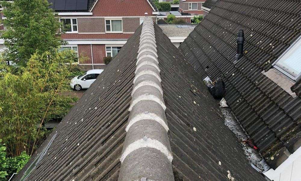 Repareren van nokvorsten in Hilversum